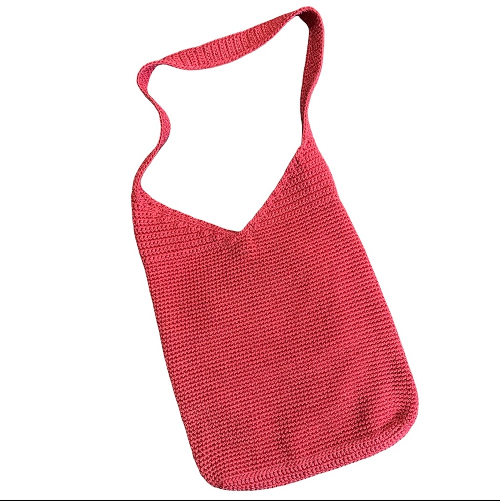 The Sak coral pink bucket bag